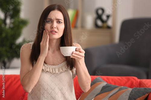 Young woman with sensitive ...