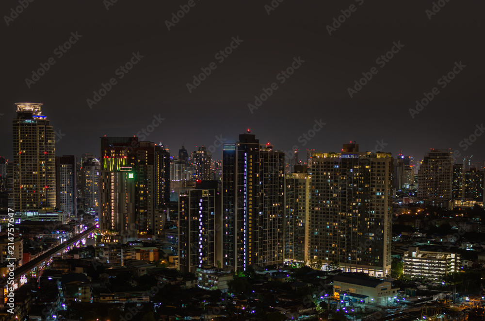 Modern buildings at night in urban city Modern buildings at night in urban city