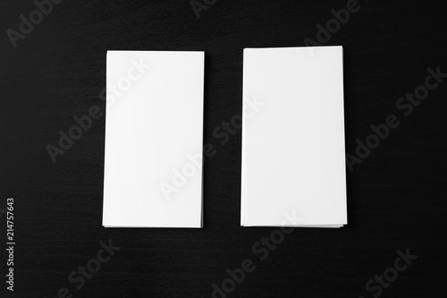 Blank business cards on dark background