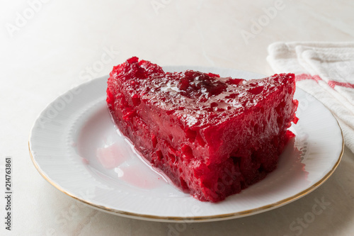 Turkish Dessert Visneli Ekmek Kadayifi / Bread Pudding with Cherry Sauce. photo