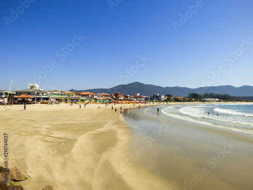 Restaurants and people enjoying the sunny day at Barra da Lagoa beach in Florianopolis  Brazil