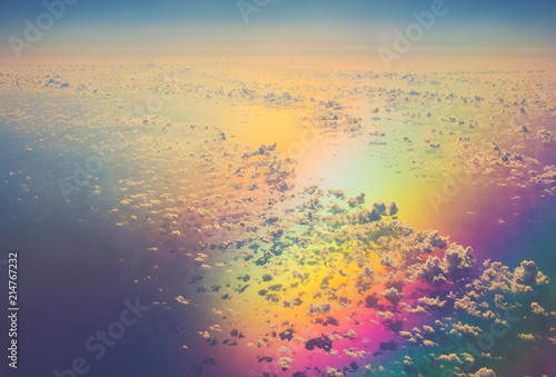 aerial panoramic cloudscape over sea in colorful reflection light photo