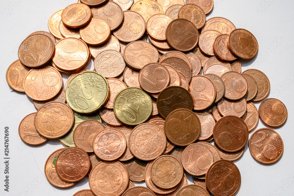 German Euro coins heaped in a large pile with bronze and copper coins German Euro coins heaped in a large pile with bronze and copper coins