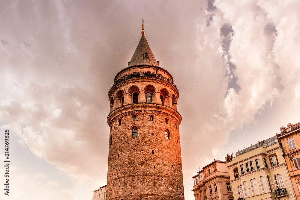 Obraz premium View over Galata Tower(Turkish: Galata Kulesi) (Galata Kulesih) Christea Turris is a medieval famous landmark stone tower architecture, in beyoglu, Istanbul.ISTANBUL/TURKEY- FEBRUARY 18,2017