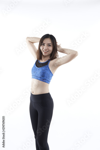 Young asian woman short hair in a fitness suit