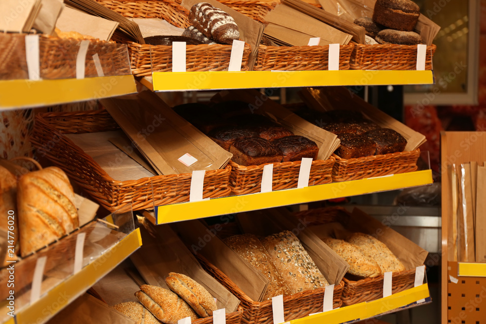 Assorted fresh tasty bread in shop