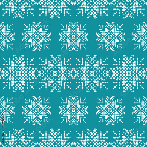 Cross stitch Norwegian snowflakes. Seamless vector background. Folk motives. Winter pattern. Textile rapport.