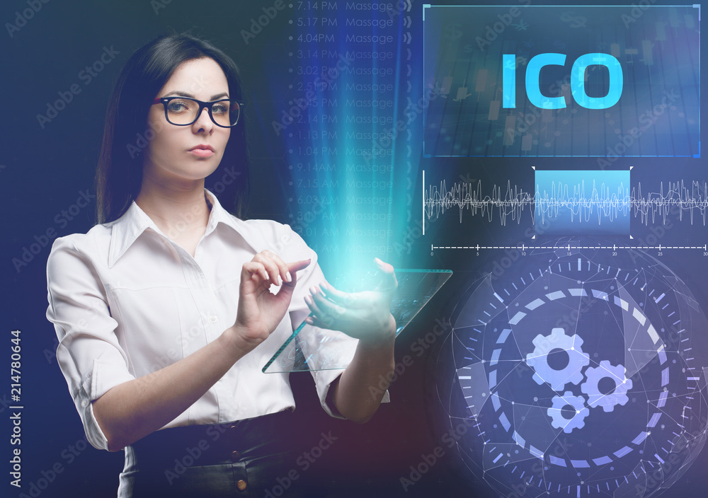 The concept of business, technology, the Internet and the network. A young entrepreneur working on a virtual screen of the future and sees the inscription: ICO The concept of business, technology, the Internet and the network. A young entrepreneur working on a virtual screen of the future and sees the inscription: ICO