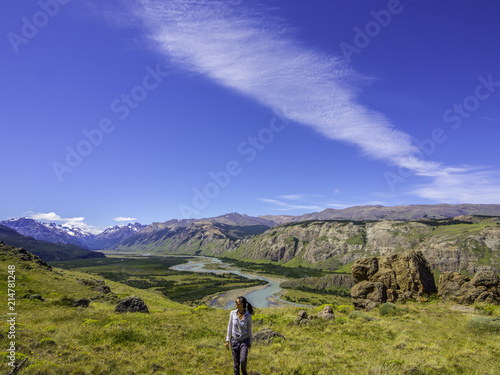 Obraz na płótnie Woman traveler enjoying the scenery of Patagonia on a hike w salonie