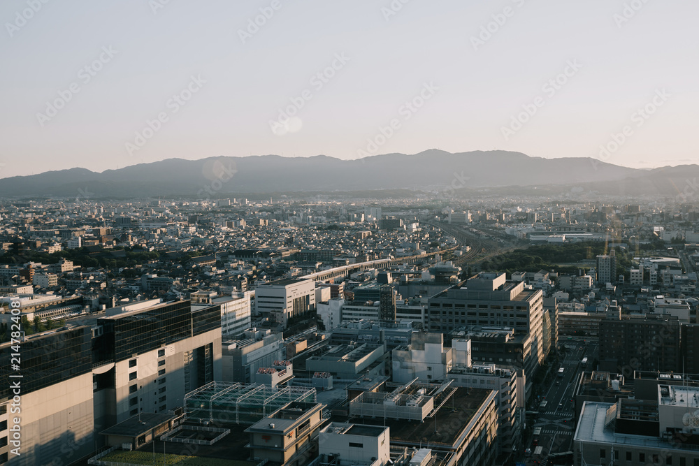 cityscape of Kyoto with sunrise in film vintage style