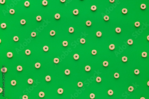 Cereal rings on green background