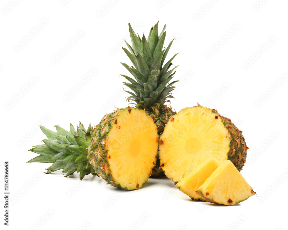 Delicious cut and whole pineapples on white background Delicious cut and whole pineapples on white background