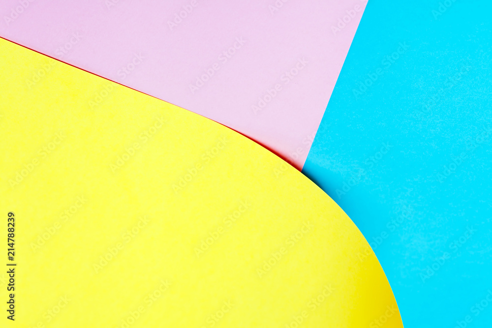 yellow pink and blue paper background.