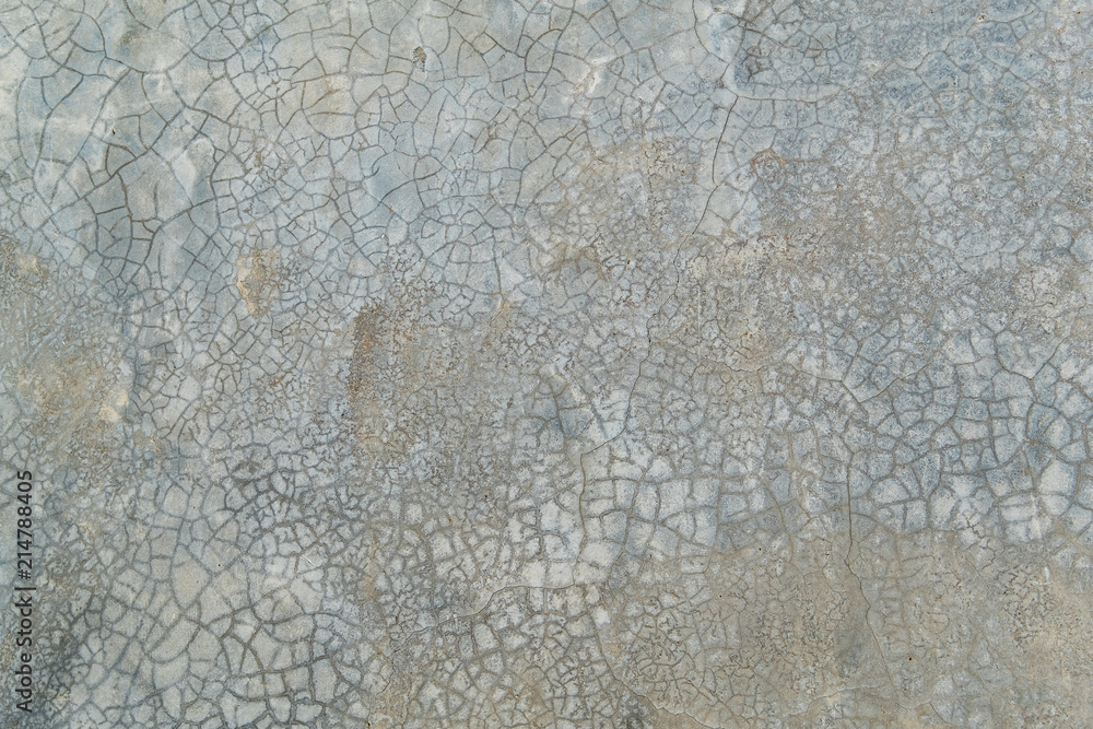 Grunge bare cracked concrete wall texture background. Material construction.