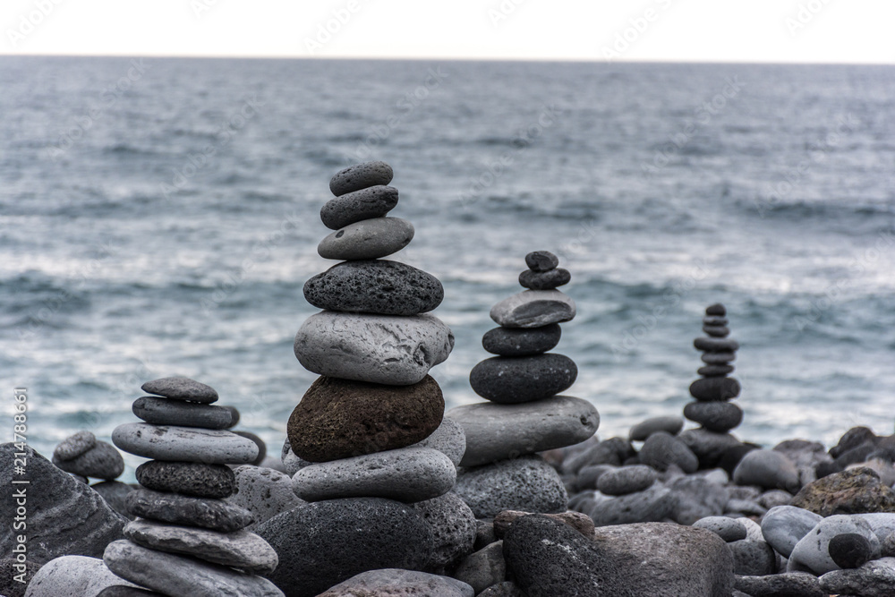 Volcanic rocks placed in pyramid mode, for enjoyment and relaxation. This unique place is located in the port of La Cruz in Tenerife (Spain) Volcanic rocks placed in pyramid mode, for enjoyment and relaxation. This unique place is located in the port of La Cruz in Tenerife (Spain)