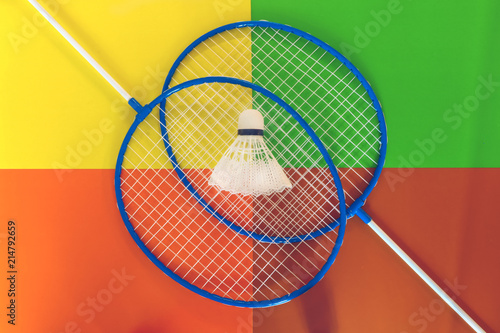 badminton racquet on a colored background