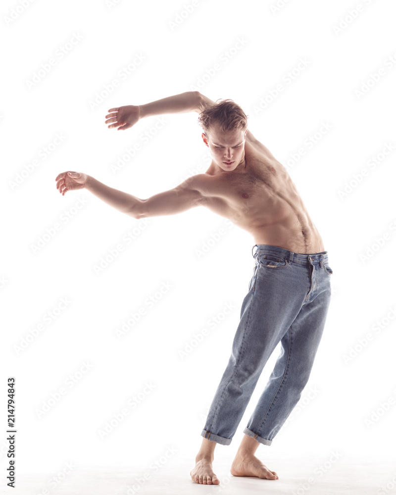 Young beautiful dancer is posing in studio Young beautiful dancer is posing in studio
