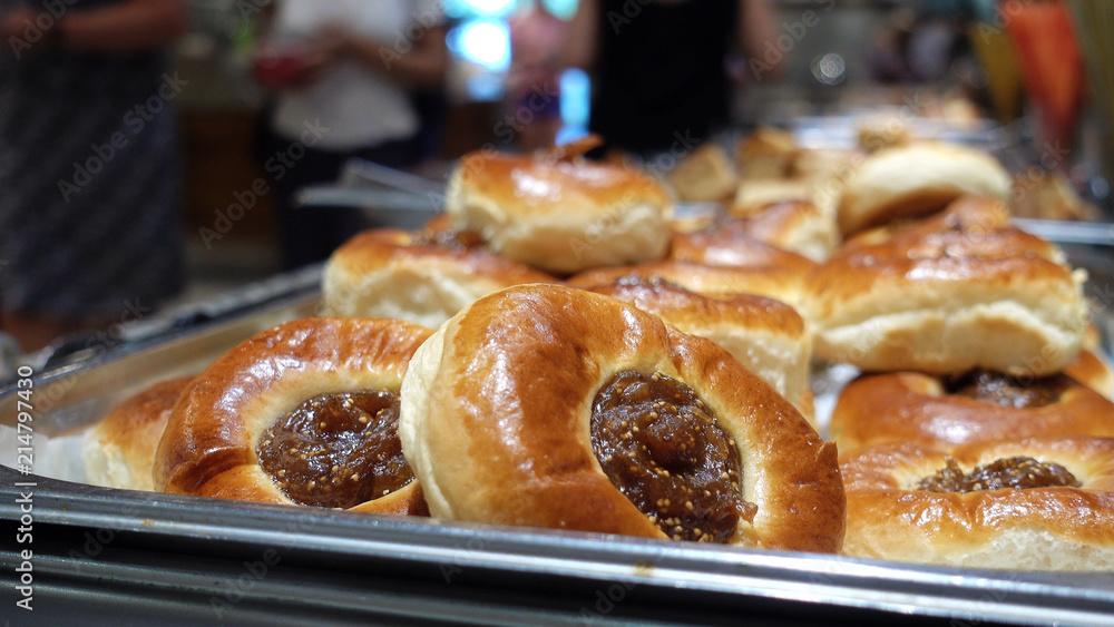 Restaurant Buffet. In the foreground buns with jam. Restaurant Buffet. In the foreground buns with jam.