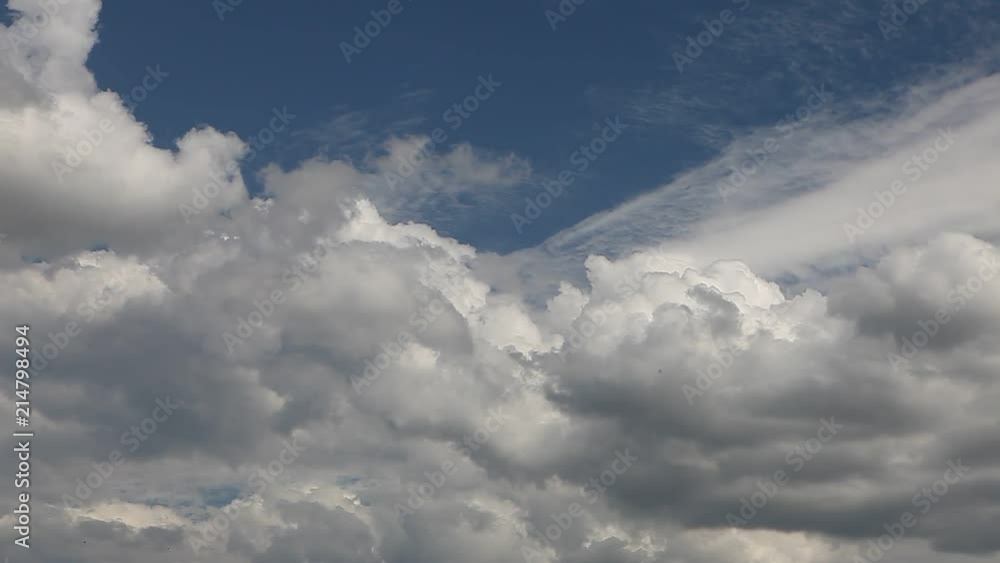 Pretty heavy clouds high contrast against blue sky on a nice day Pretty heavy clouds high contrast against blue sky on a nice day