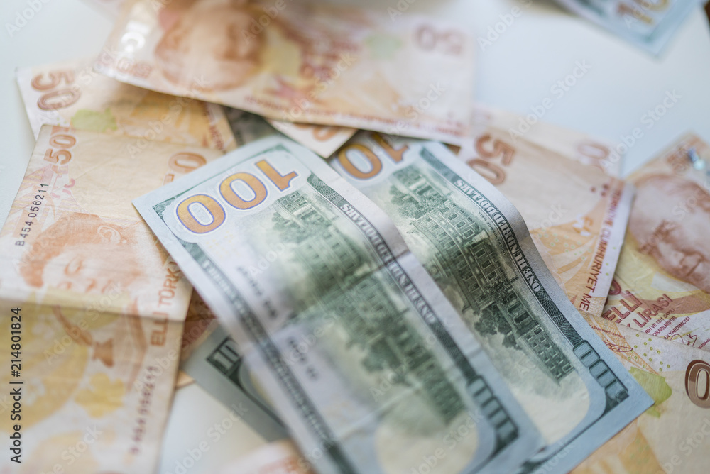 money background with american dollars and turkish liras, hundred dollars and fifty turkish liras background. random moneys, economic and financial crisis money background with american dollars and turkish liras, hundred dollars and fifty turkish liras background. random moneys, economic and financial crisis