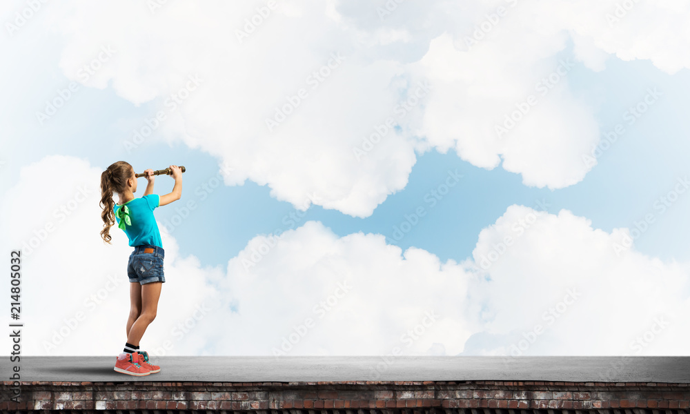 Concept of careless happy childhood with girl exploring this world Concept of careless happy childhood with girl exploring this world