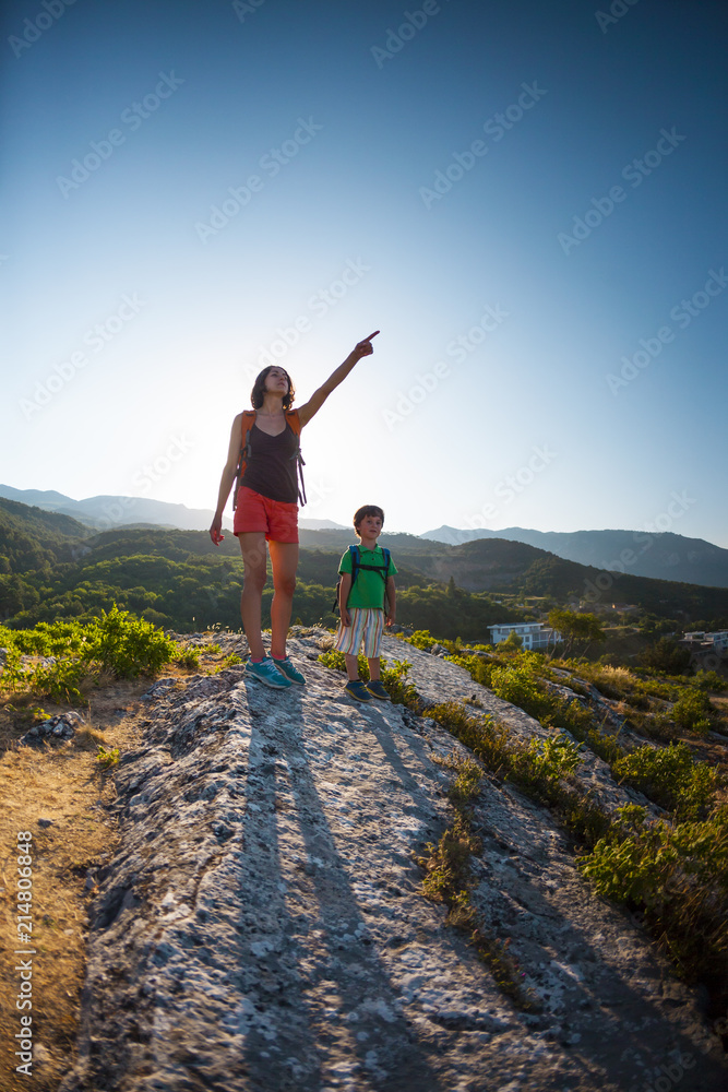 Fototapeta premium A woman is traveling with a child.