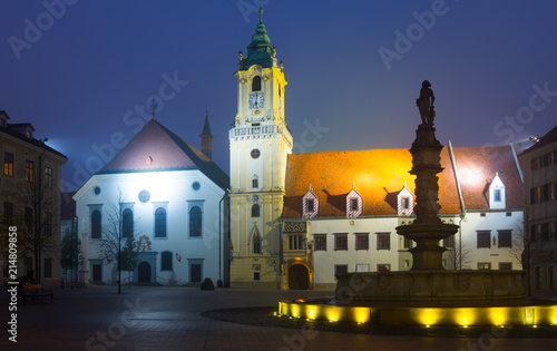 Main Square in old historic city Bratislava illuminated at dusk
