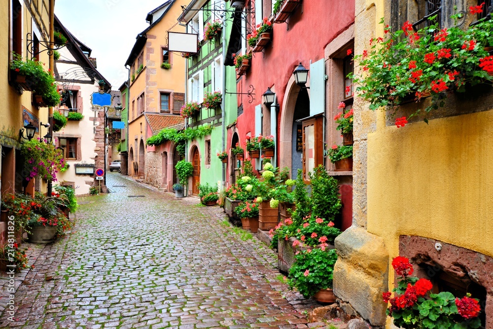Picturesque street in the of the town of Riquewihr, Alsace, France