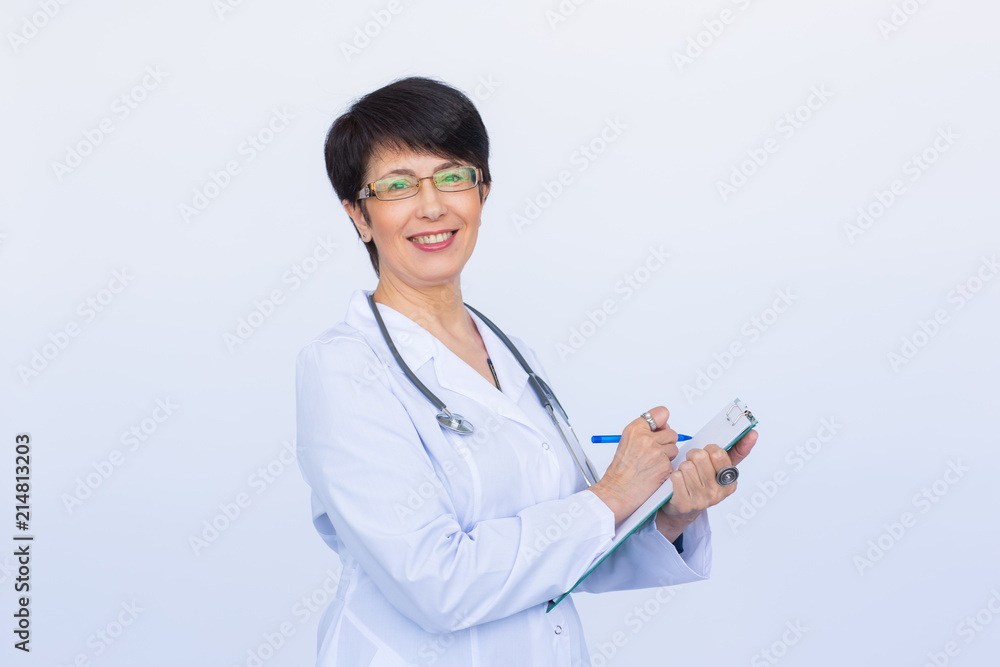 Medical doctor writing prescription over white background. Medical doctor writing prescription over white background.