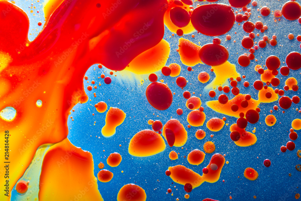 Red bubbles of blood cells on blue background closeup. Abstraction of medicine. Concept of micro processes in vessels Red bubbles of blood cells on blue background closeup. Abstraction of medicine. Concept of micro processes in vessels