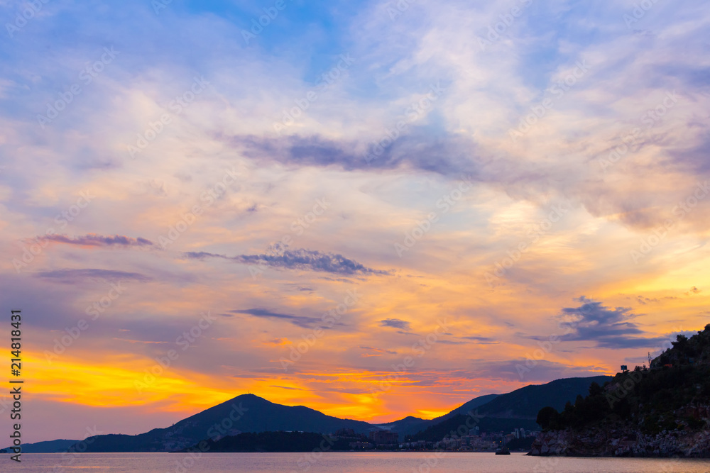 Awesome colorful sunset on the Adriatic sea coastline in Montenegro, gorgeous seascape