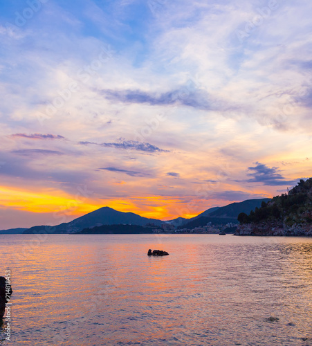Awesome colorful sunset on the Adriatic sea coastline in Montenegro, gorgeous seascape