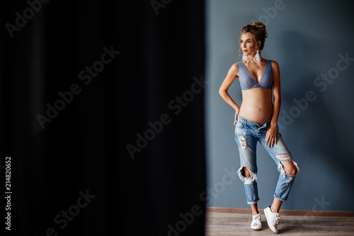 Pregnant girl in jeans.