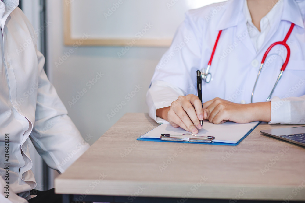 Female doctors and patients man to talk about healing. Consulting and treatment methods Female doctors and patients man to talk about healing. Consulting and treatment methods