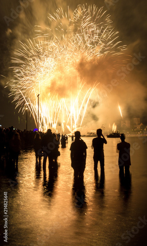 Photography People standing in the river Rhine (Rhein) in Cologne, Germany during the annual