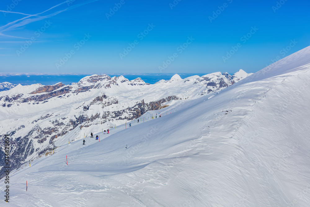 A wintertime view on Mt. Titlis in Switzerland. The Titlis is a mountain, located on the border between the Swiss cantons of Obwalden and Bern, it is usually accessed from the town of Engelberg. A wintertime view on Mt. Titlis in Switzerland. The Titlis is a mountain, located on the border between the Swiss cantons of Obwalden and Bern, it is usually accessed from the town of Engelberg.