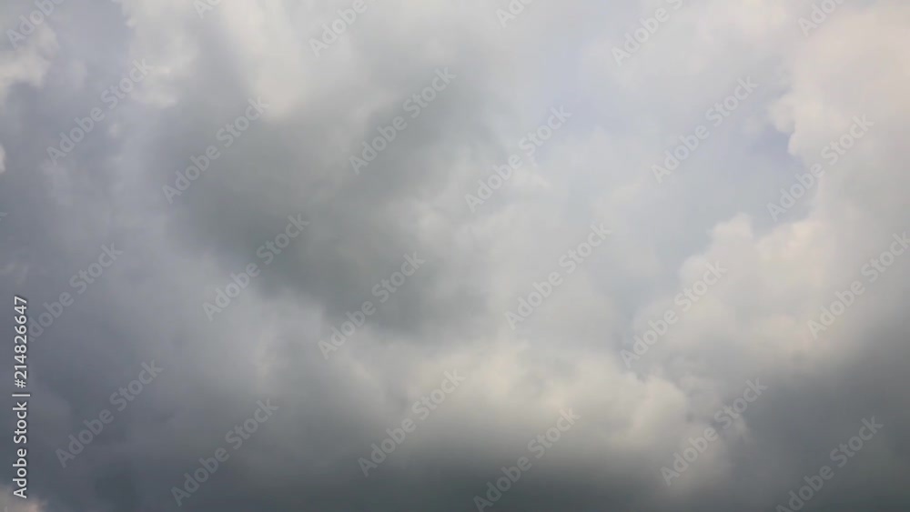 Fast moving clouds, White clouds running over blue sky. Time Lapse, Storm clouds lift, reveal bright white fluffy mass forming in blue sky. Fast moving clouds, White clouds running over blue sky. Time Lapse, Storm clouds lift, reveal bright white fluffy mass forming in blue sky.