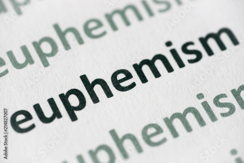 word euphemism printed on paper macro