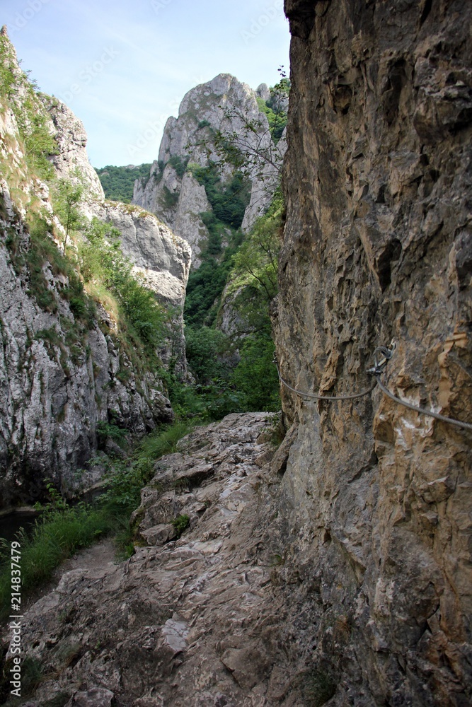 Dangerous trail in the canyon  - Turda gorge Cheile Turzii is a natural reserve on Hășdate River situated near Turda close to Cluj-Napoca, in Transylvania, Romania, Europe