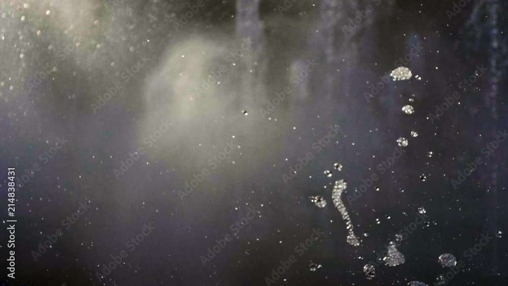 Close-up shot of water drops of fountain in the summer park. Slow motion. HD Close-up shot of water drops of fountain in the summer park. Slow motion. HD