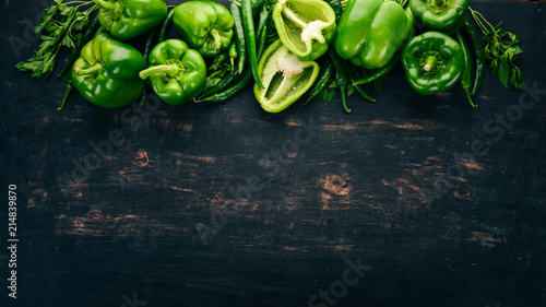 Fresh green pepper and chili pepper. Organic food. Top view. Free space for text.
