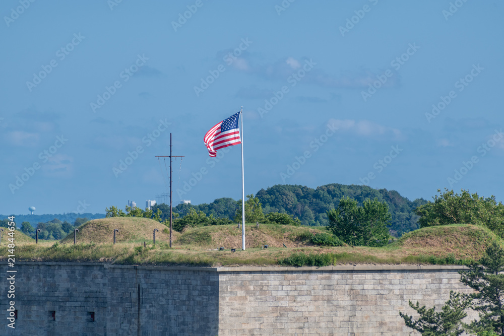 Fototapeta premium American Flag on Old Fort