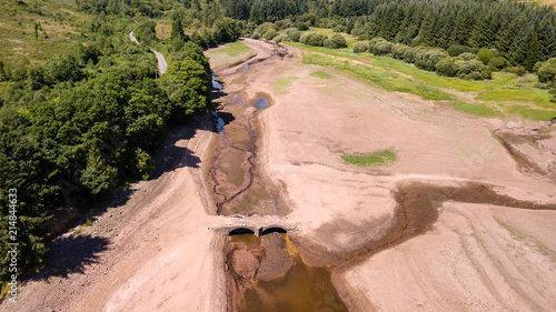 Aerial drone view of a dried up reservoir in the Brecon Beacons during a summer heatwave (Llwyn-On) photo