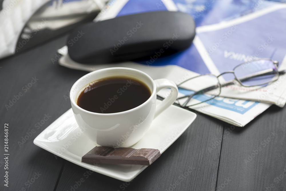 a cup of coffee and something sweet a cup of coffee and something sweet