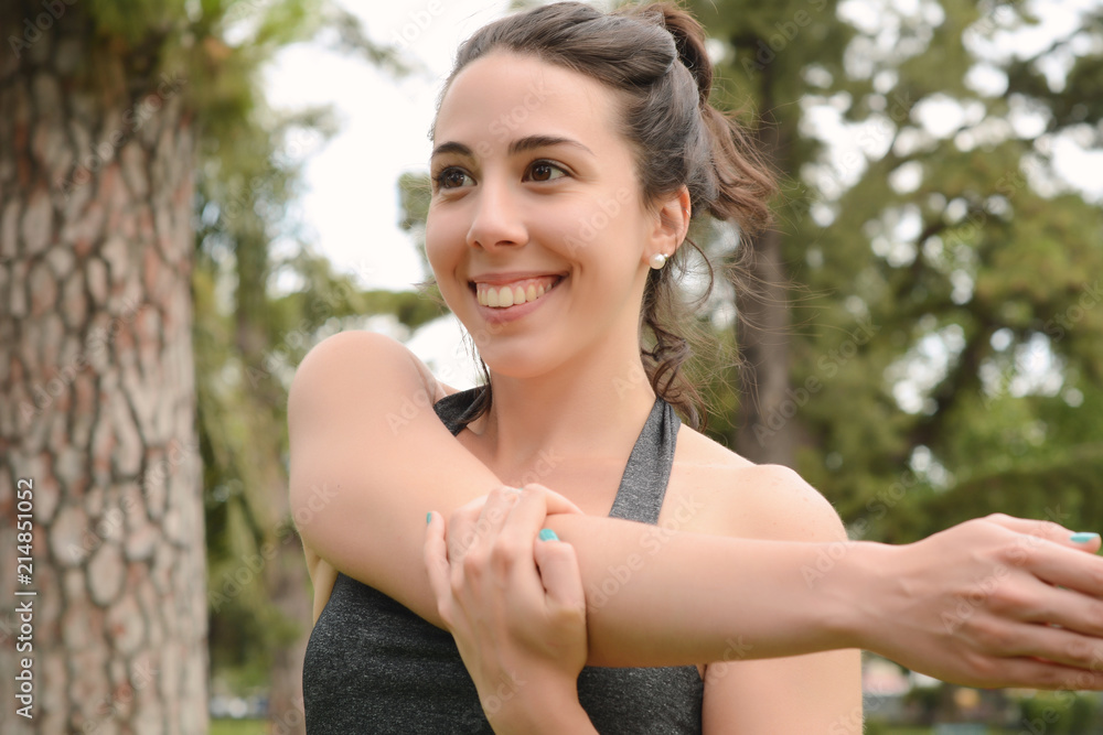 Portrair of young beautiful woman doing exercise at park Portrair of young beautiful woman doing exercise at park