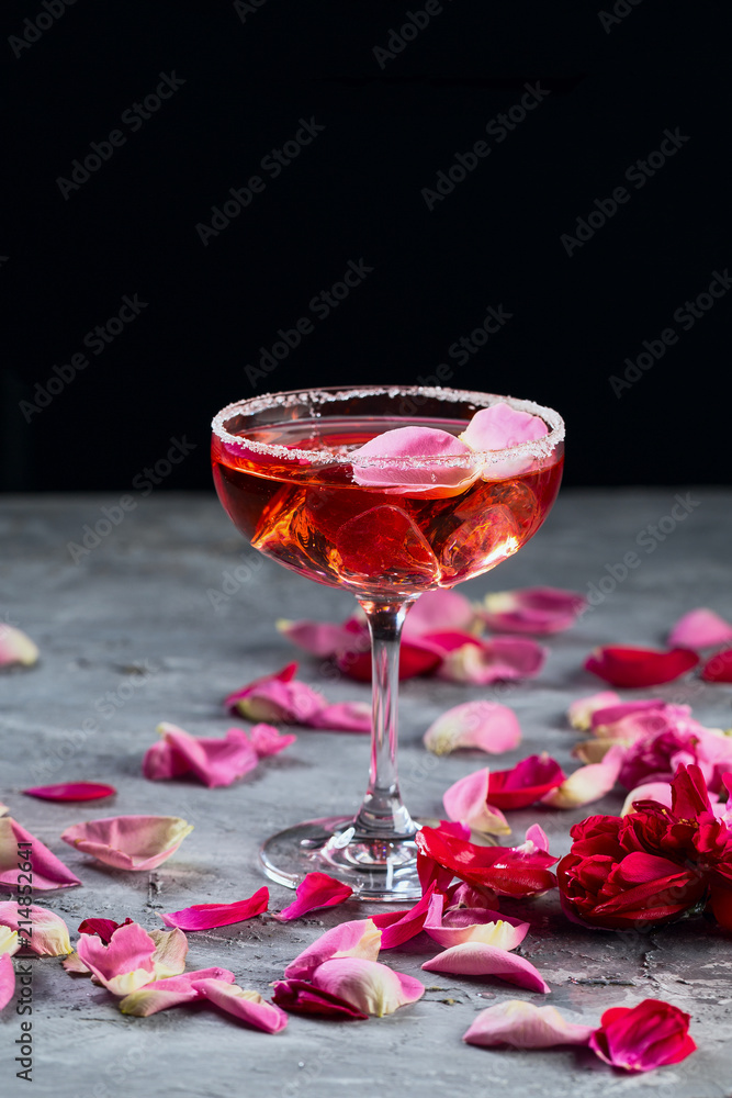 Rose cocktail. On grey stone concrete background. Copy space