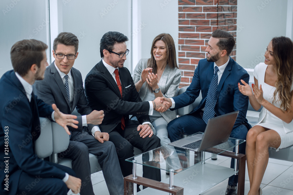 business colleagues greet each other at an informal meeting business colleagues greet each other at an informal meeting