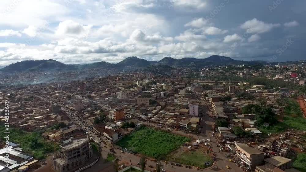 Descending into Yaoundé with hills view of residential apartment buildings on a summer day Descending into Yaoundé with hills view of residential apartment buildings on a summer day