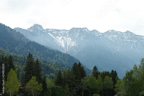 landscape in the Alps with snow-capped mountain peaks in the background, Bavaria, Germany