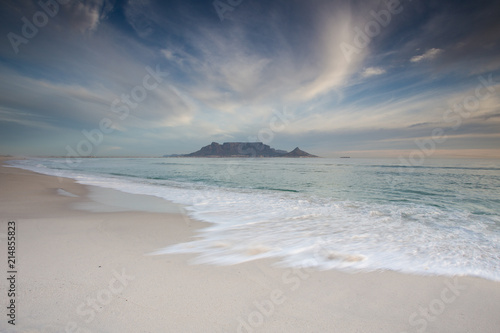 Stunning clouds over Table Mountain in Cape Town South Africa as seen from blouberg beach  one of the top holiday destinations in the world